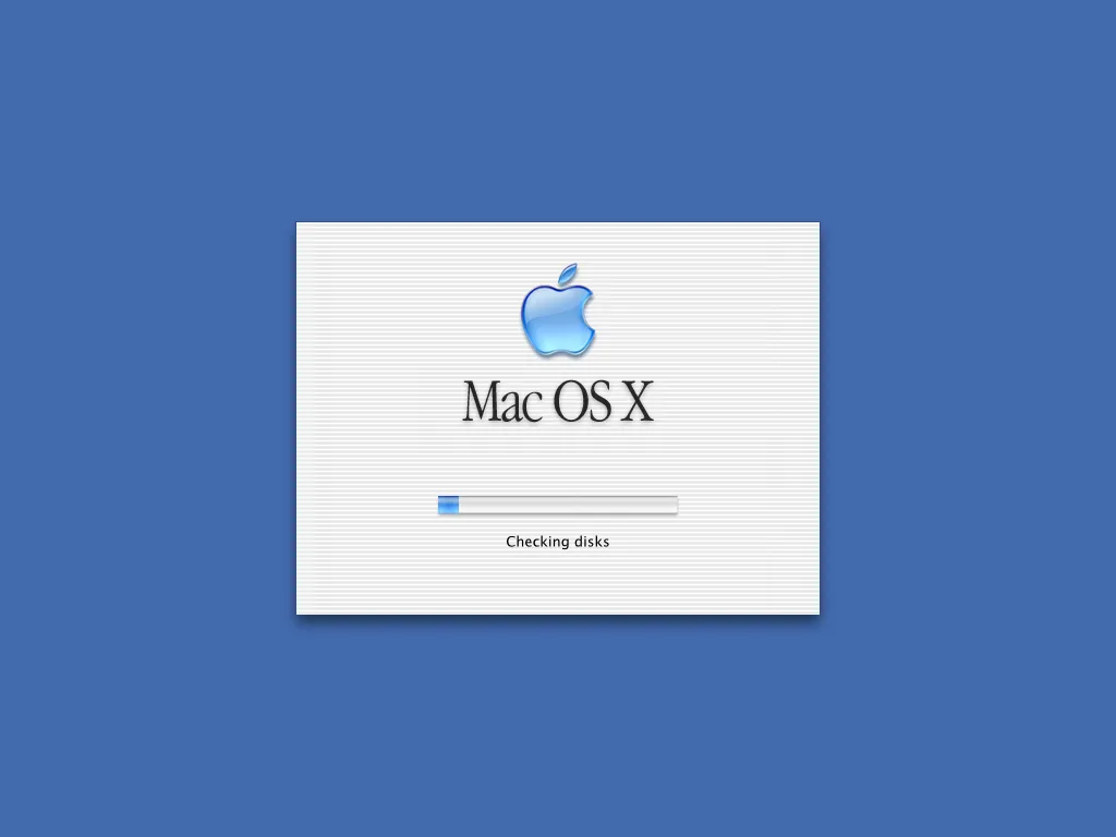 Màn hình khởi động macOS X với giao diện Aqua đặc trưng của Apple