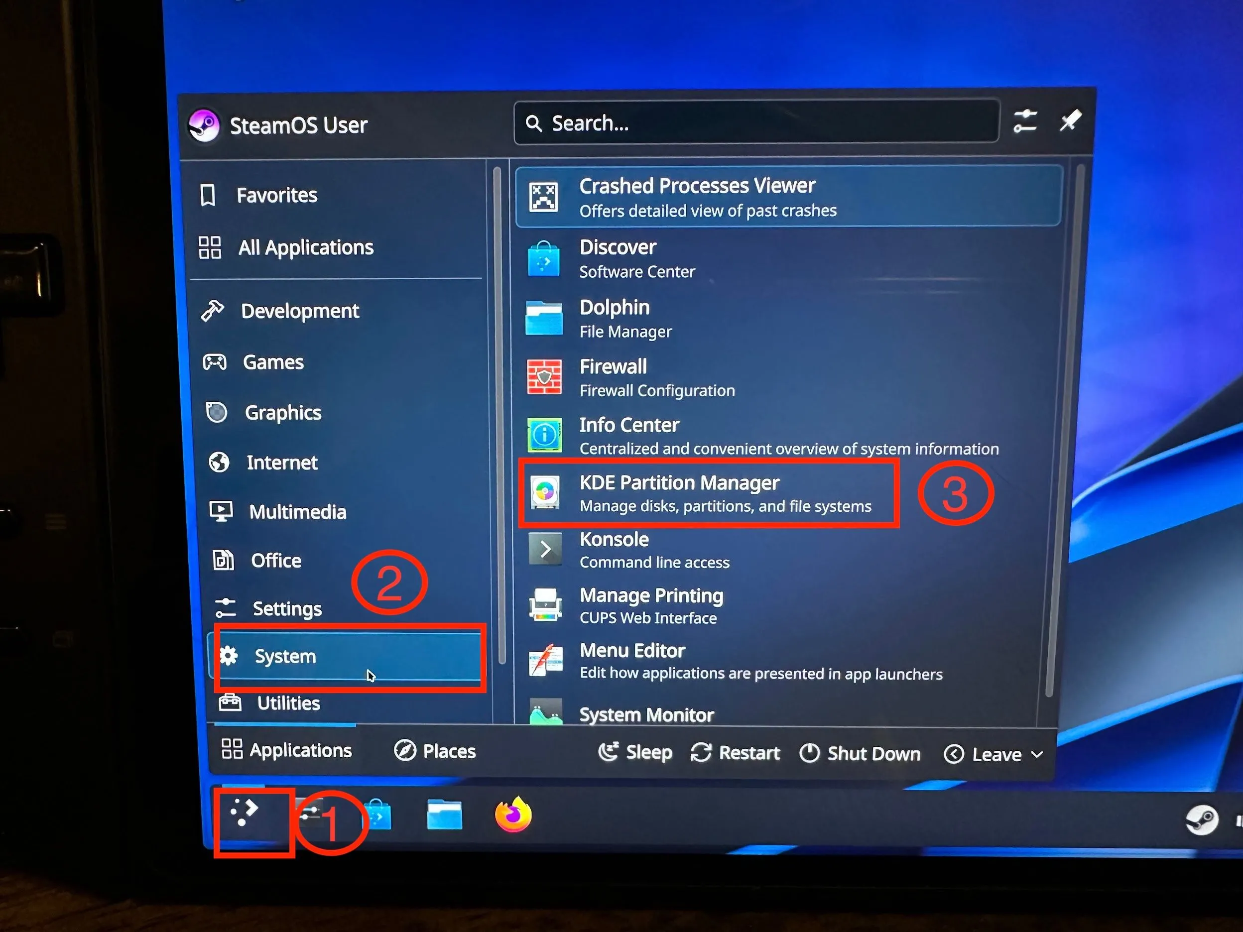 Menu ứng dụng SteamOS hiển thị đường dẫn System &gt; KDE Partition Manager, minh họa cách mở công cụ quản lý phân vùng.