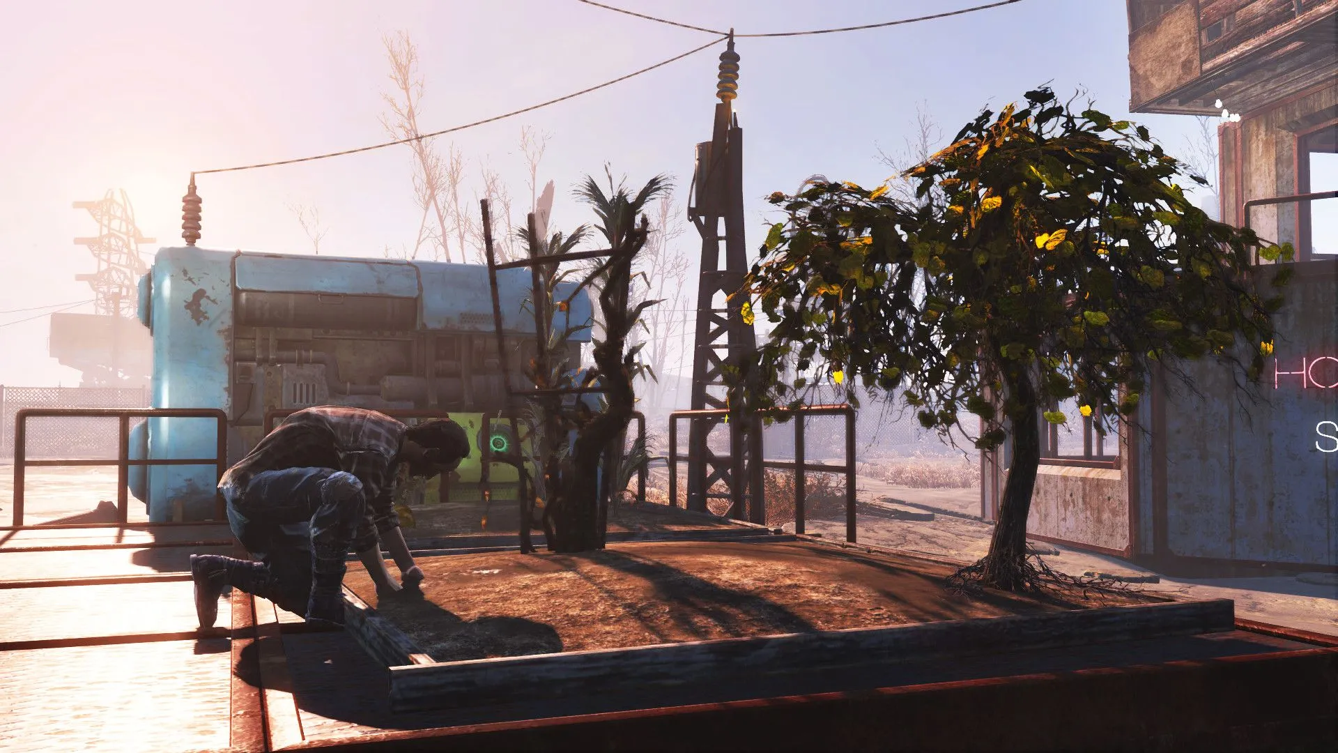 Người chơi đang chăm sóc mùa màng tại một khu định cư trong Fallout 4, minh họa hệ thống xây dựng và chế tạo.