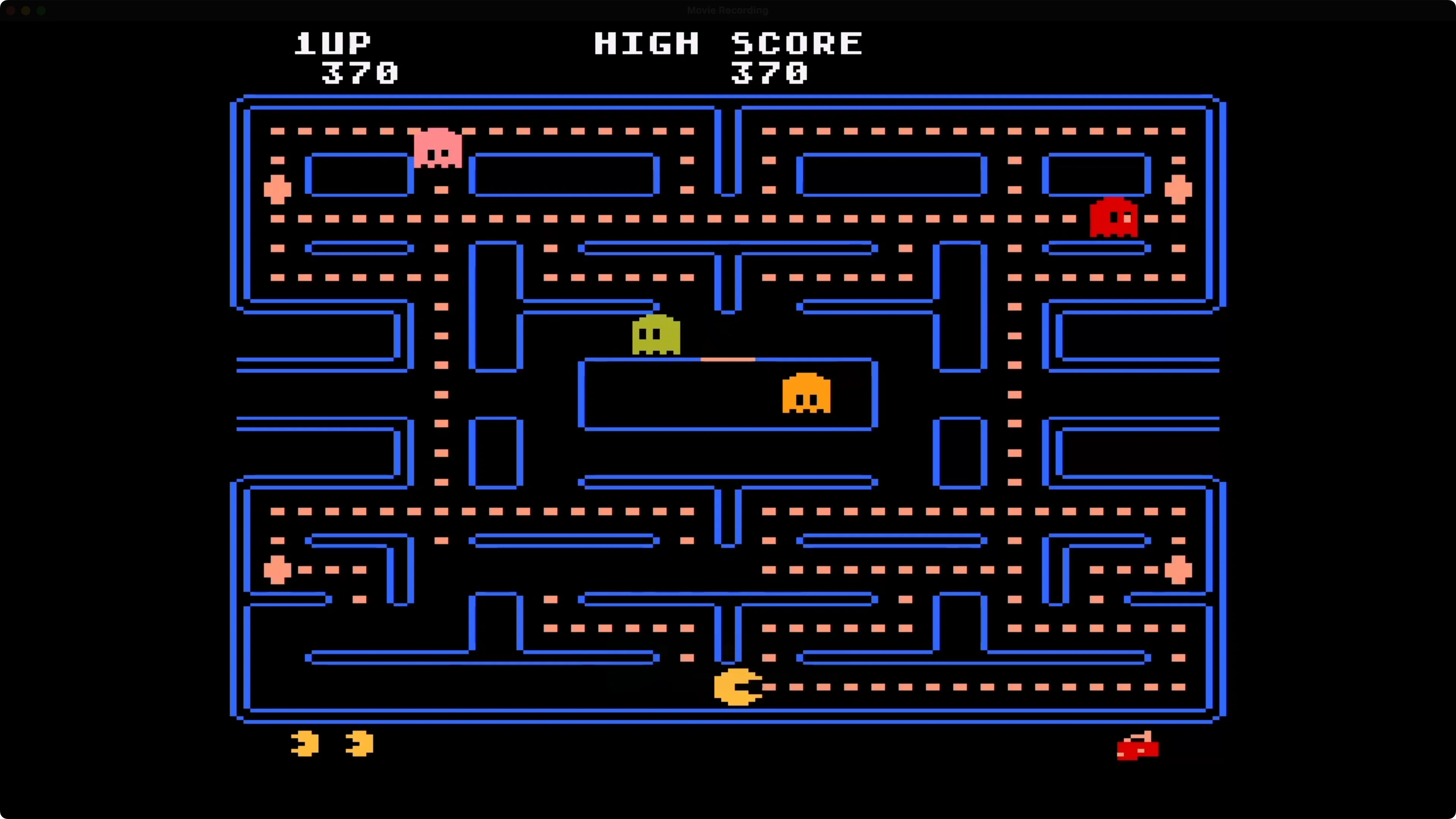Trò chơi Pac-Man chạy trên Apple TV, cho thấy lỗi âm thanh tiếp tục xảy ra khi giả lập các tựa game arcade cổ điển.