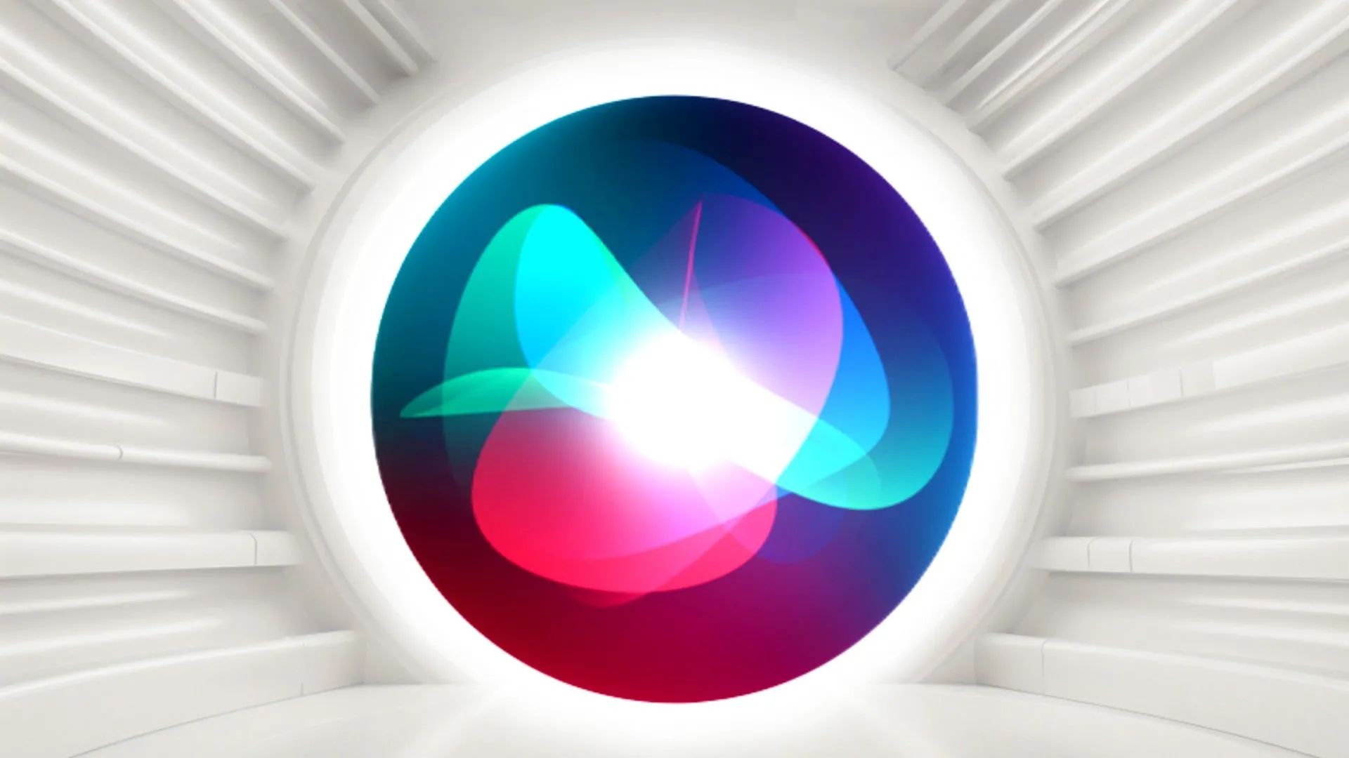 Biểu tượng Siri của Apple trên nền trắng đơn giản, đại diện cho trợ lý ảo thông minh sắp được nâng cấp với khả năng AI tiên tiến trên các thiết bị Mac, iPhone, iPad.