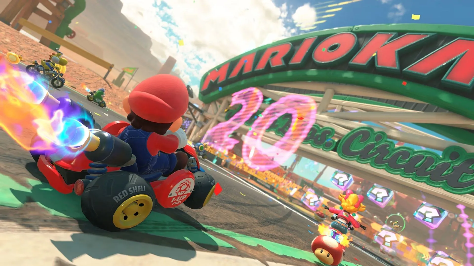 Cảnh đua xe dưới nước với hiệu ứng đồ họa sống động trong Mario Kart World.