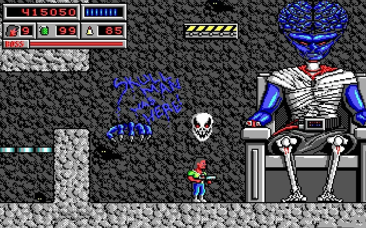 Cảnh trong game Bio Menace với nhân vật Snake Logan đối đầu một quái vật ngoài hành tinh có bộ não lớn, thể hiện đồ họa pixel chi tiết.