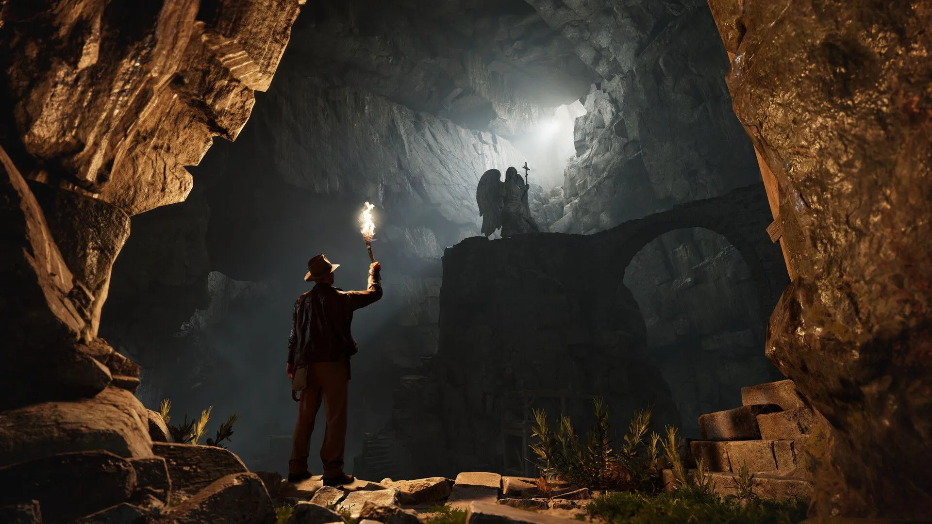 Indiana Jones trong một ngôi đền nhìn vào một bức tượng từ xa trong Indiana Jones and the Great Circle The Order of Giants
