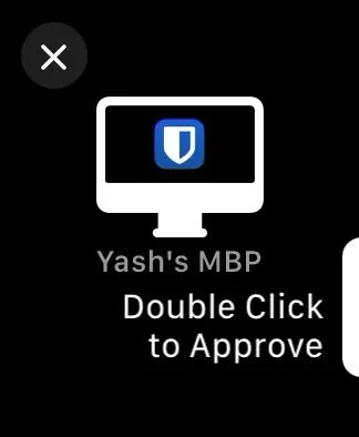 Màn hình Apple Watch hiển thị yêu cầu xác thực để mở khóa Bitwarden, với hướng dẫn &quot;Nhấp đúp nút sườn để phê duyệt&quot; (Double-click the Side button to approve).