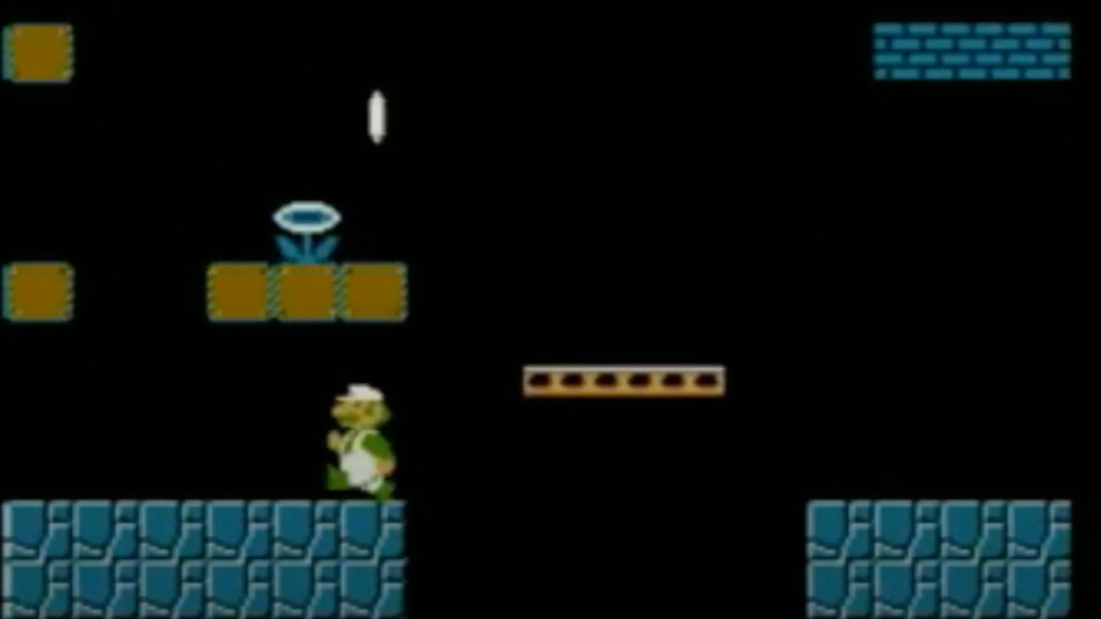 Mario đang chạy trong một cấp độ Super Mario Bros. với các khối gạch và kẻ thù Goomba