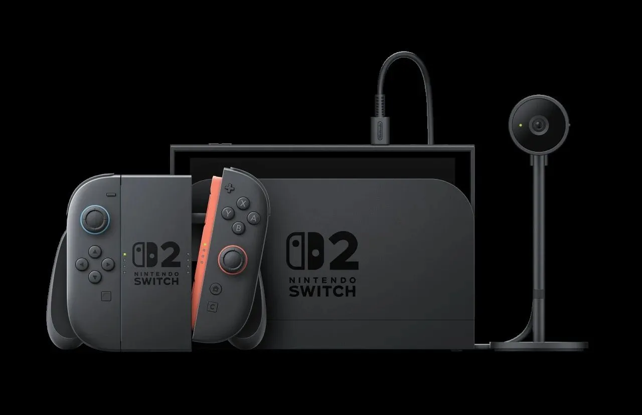 Máy chơi game Nintendo Switch 2 được gắn thêm phụ kiện camera bên ngoài qua cổng USB-C, minh họa tính năng tương tác trực tiếp qua video.