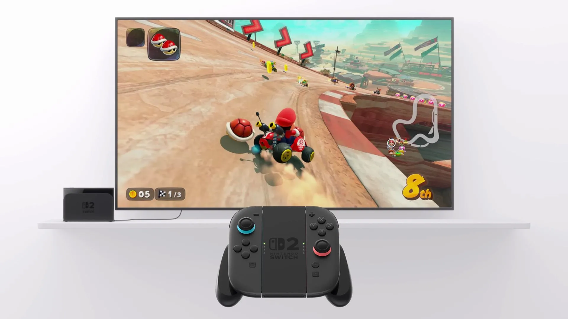 Máy chơi game Nintendo Switch 2 với tay cầm Joy-Con 2 và game Mario Kart trên màn hình TV.