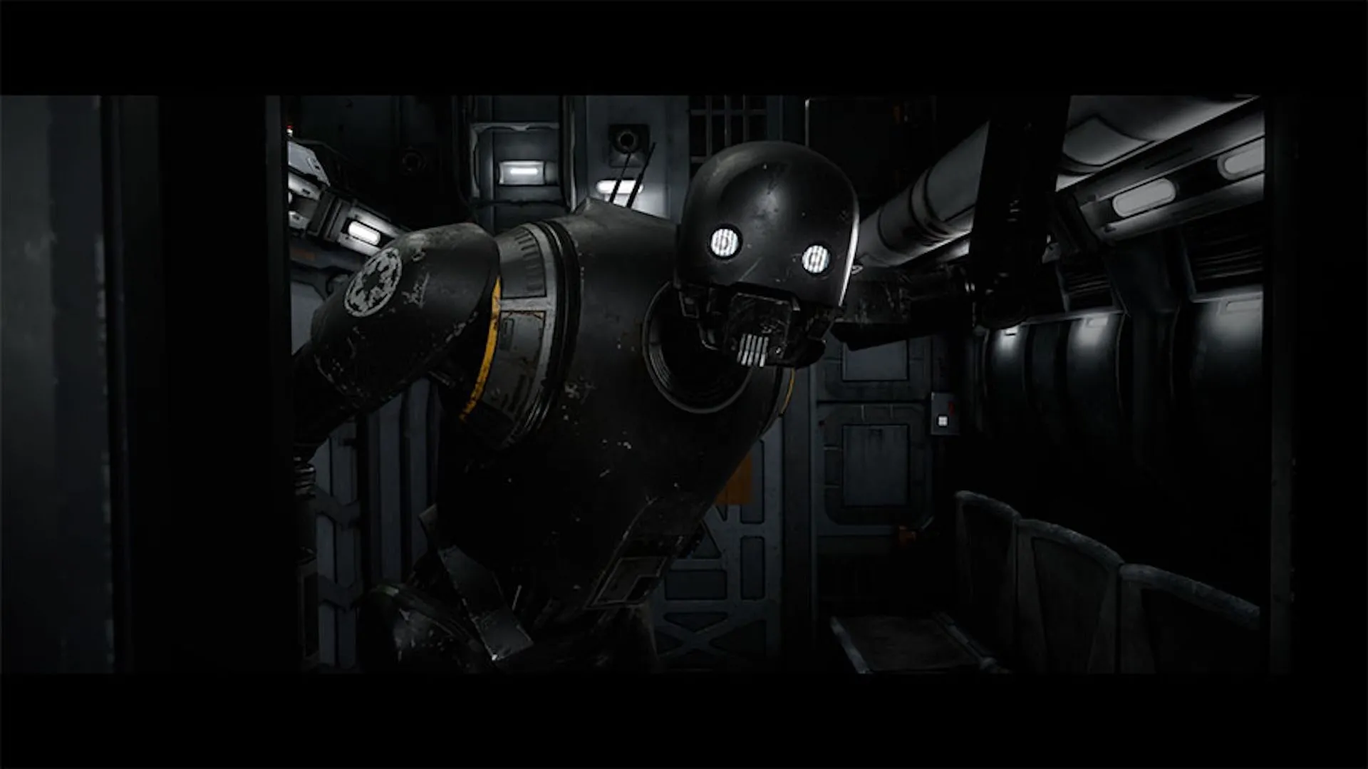 Một droid lớn đang nhìn một người dùng VR trong Star Wars: Secrets of the Empire.
