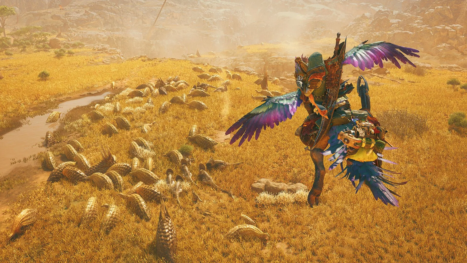 Người chơi cưỡi thú di chuyển qua sa mạc rộng lớn trong Monster Hunter Wilds.