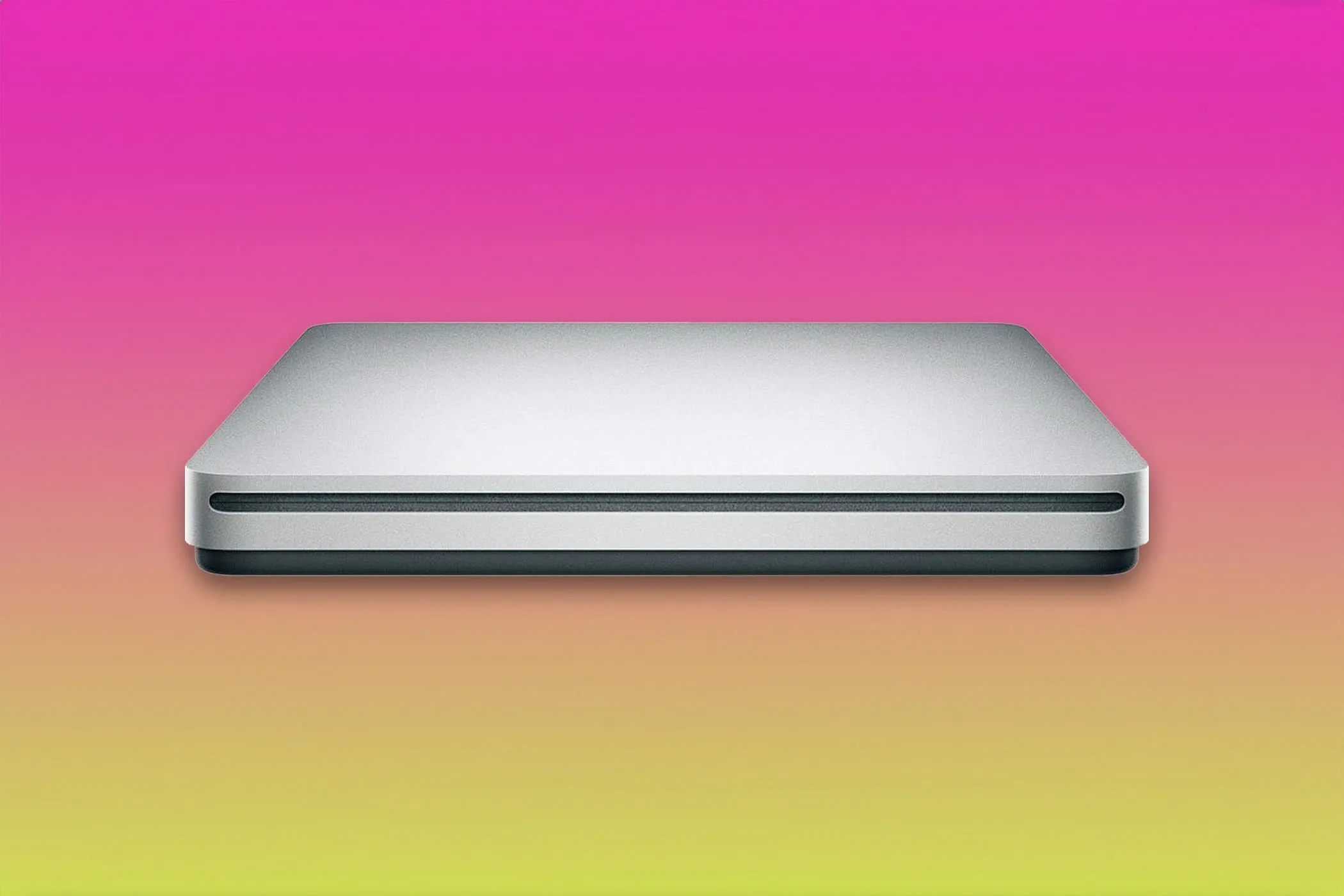 Ổ đĩa Apple USB SuperDrive trên nền gradient, biểu tượng cho sự thay đổi của Apple với ổ đĩa quang