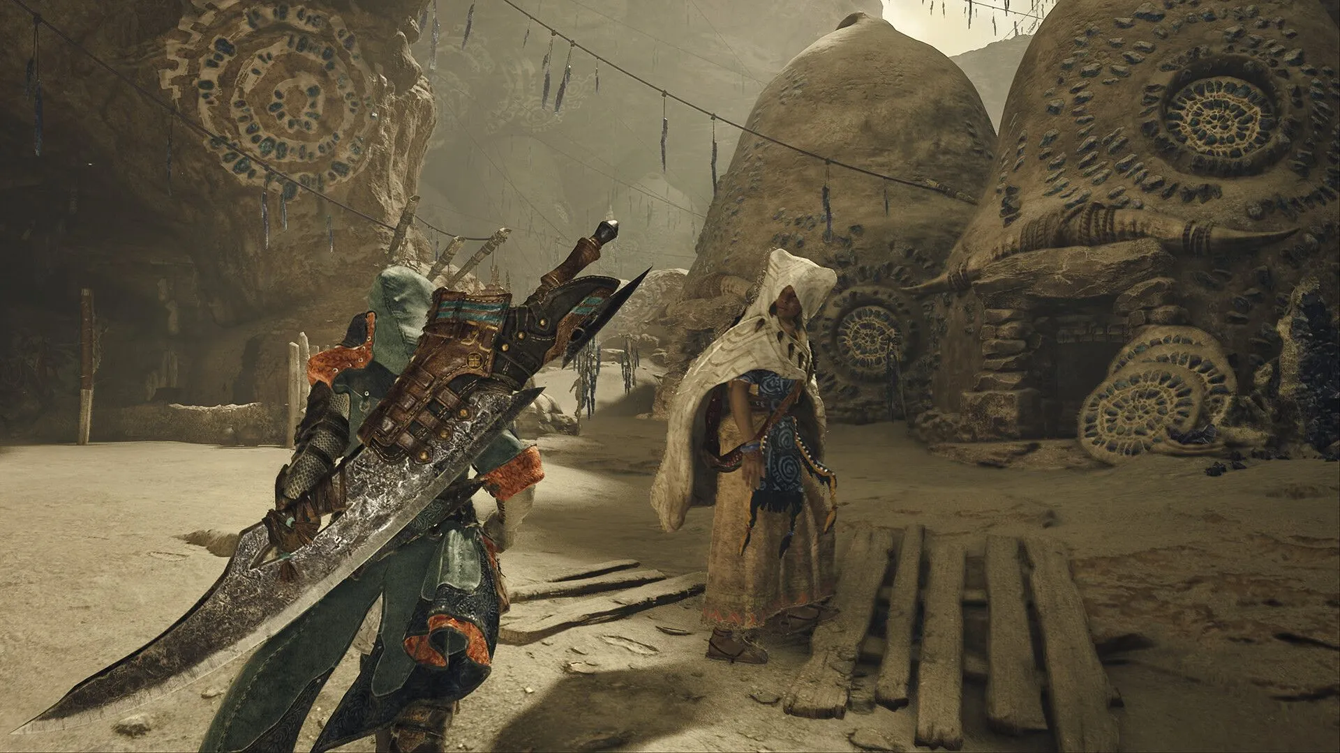 Thợ săn đang chuẩn bị vũ khí trước cuộc đi săn trong Monster Hunter Wilds.