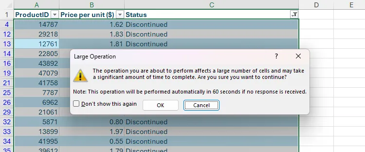 Thông báo cảnh báo từ Excel cho biết thao tác xóa dòng đã lọc sẽ mất nhiều thời gian