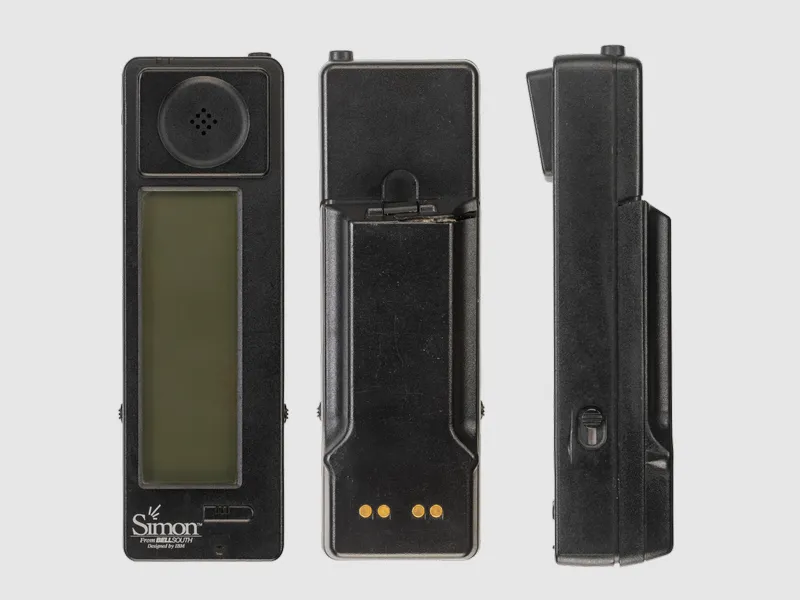 Điện thoại thông minh IBM Simon, chiếc smartphone đầu tiên trên thế giới, hiển thị màn hình cảm ứng và giao diện ứng dụng cơ bản như máy tính và lịch.