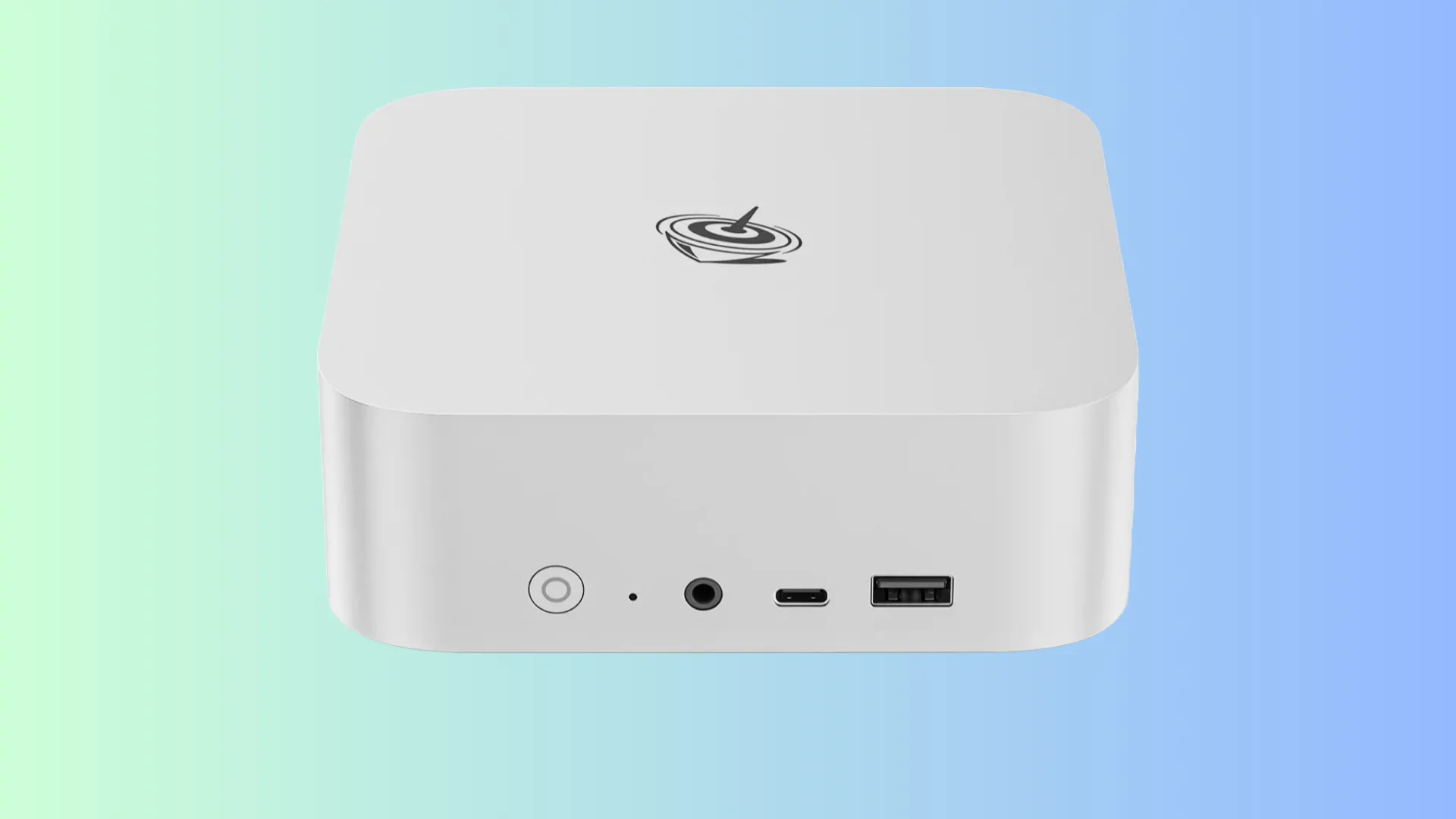 Mini PC Beelink SER8 màu đen đặt trên nền xanh ngọc và xanh dương.