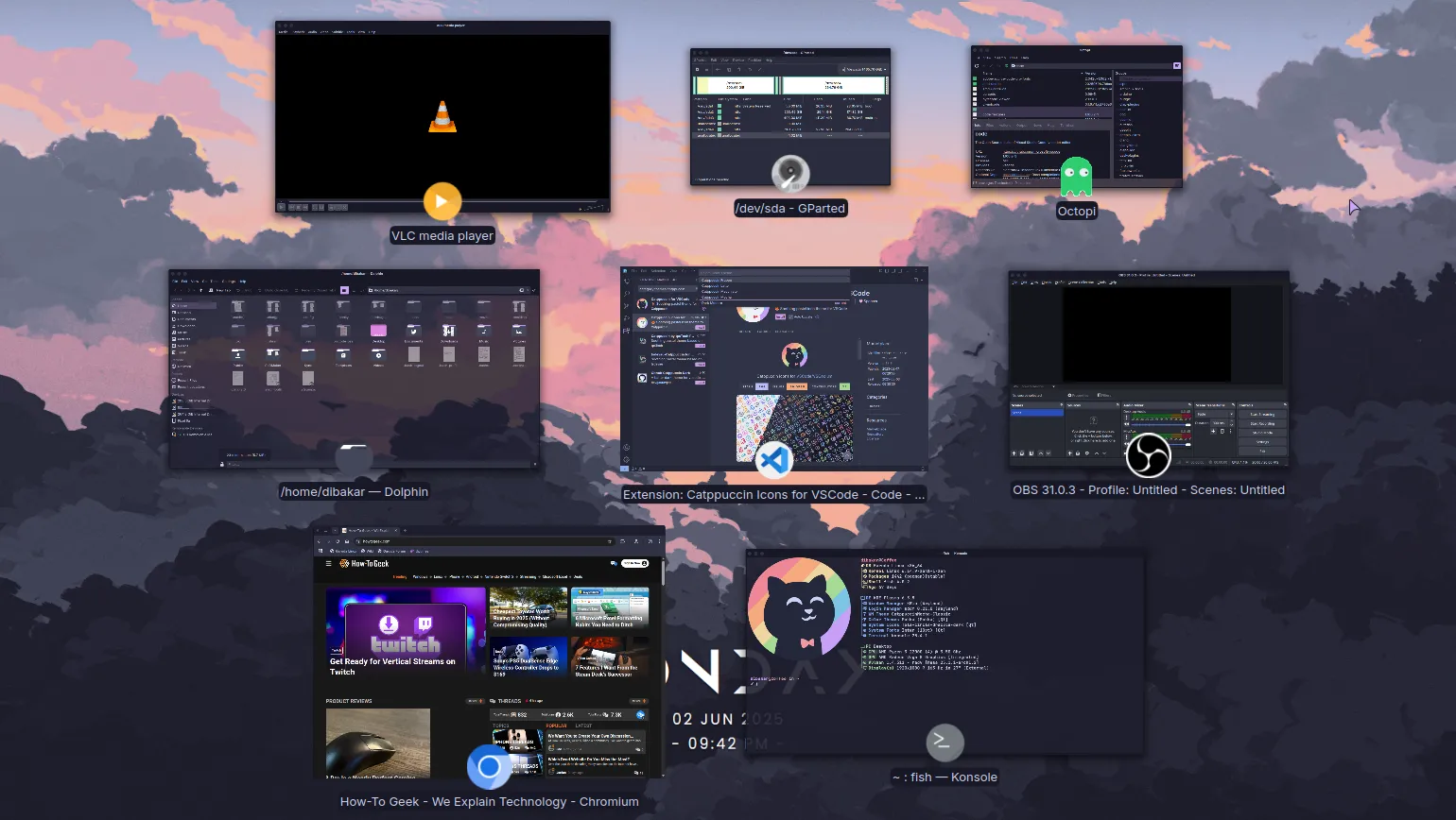 Các ứng dụng mã nguồn mở như trình quản lý tệp, trình duyệt Firefox và VLC trên Garuda Linux với giao diện đồng nhất theo chủ đề Catppuccin