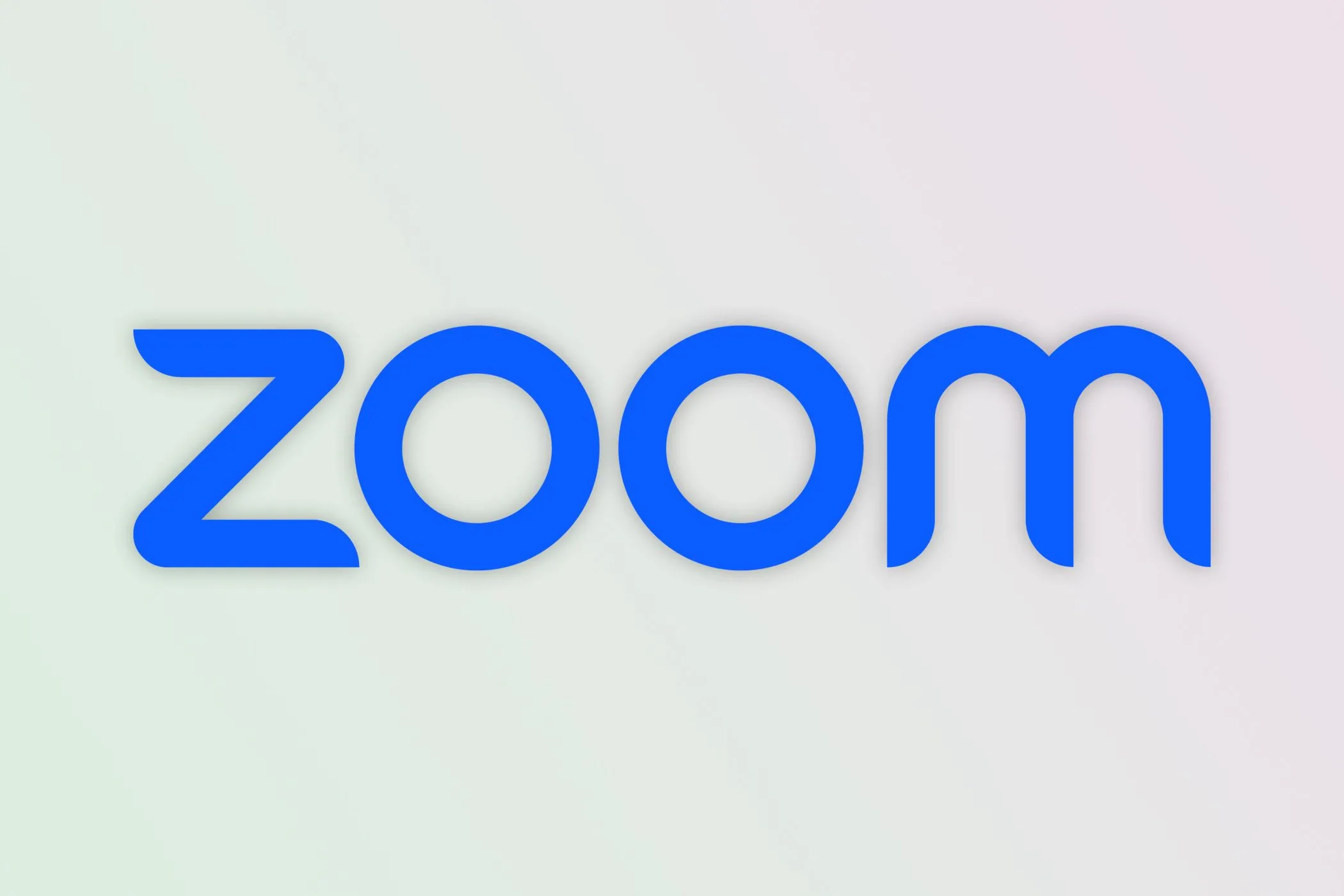 Logo ứng dụng Zoom, tượng trưng cho sự phổ biến của các cuộc họp và thuyết trình trực tuyến trong môi trường làm việc hiện đại.